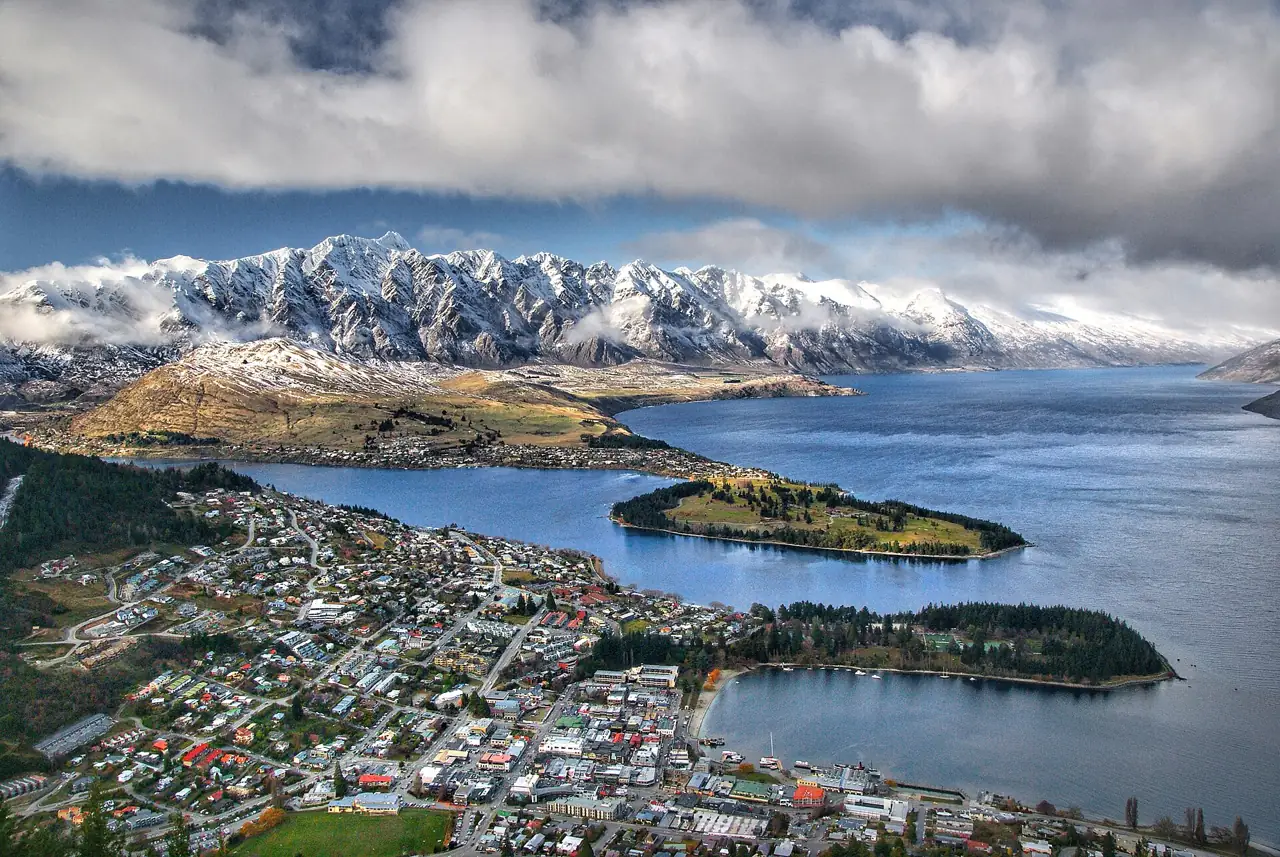Queenstown and Lake Wakatipu from above, with snow on the Remarkables